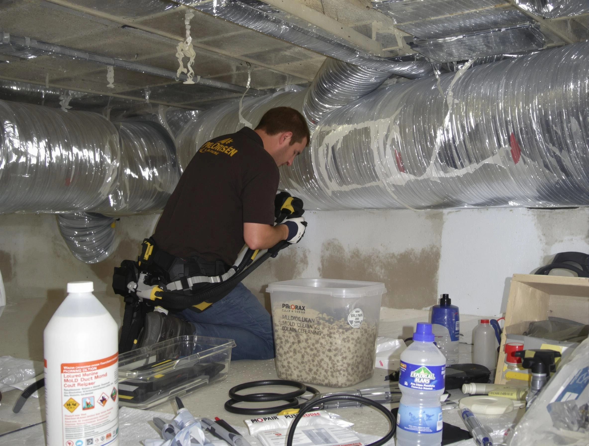 Waltham Air Duct Cleaning specialist performing professional mold removal from air ducts in Waltham